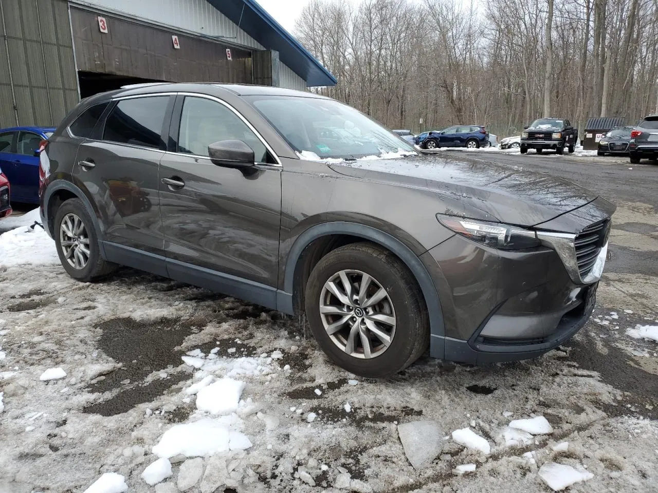 Фото MAZDA CX-9 TOURING – збоку