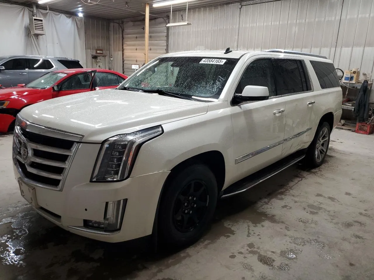 Фото CADILLAC ESCALADE ESV LUXURY – збоку