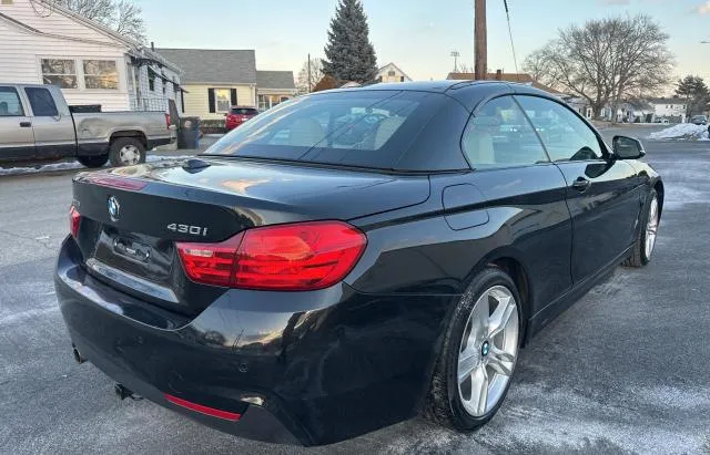 Фото BMW 430XI кабріолет – справа ззаді