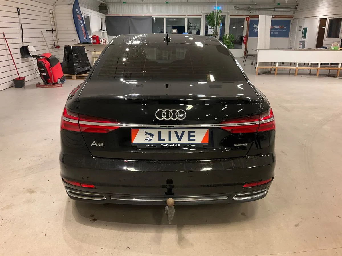Фото Audi A6 45 TFSI quattro Sport – зліва ззаді